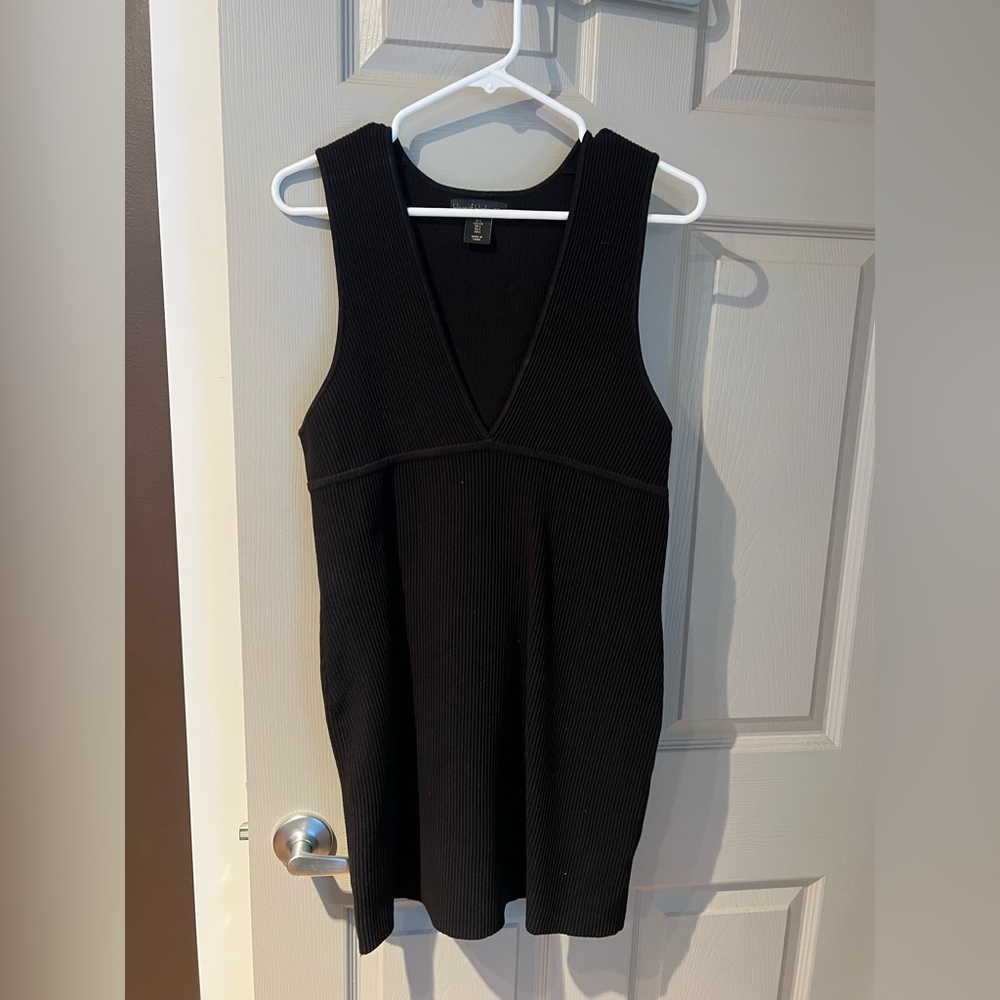 Black ribbed mini dress. Size L. Never worn.